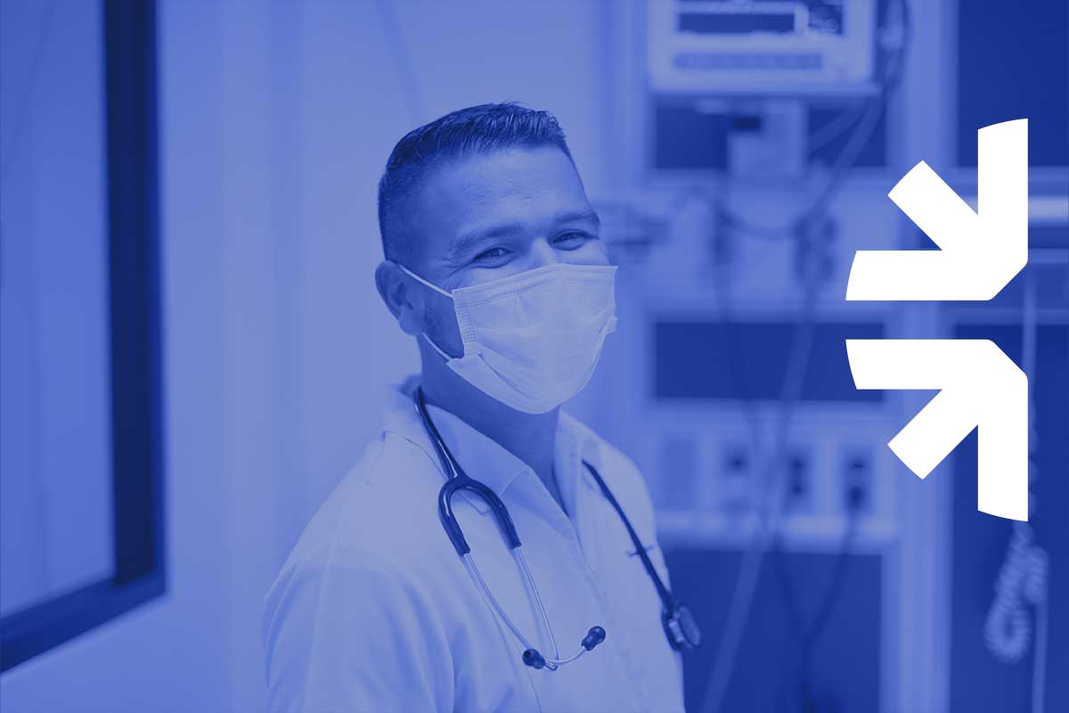Summit Health Oregon smiling doctor with a mask on